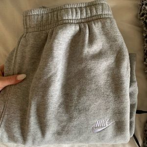 grey nike sweatpants .